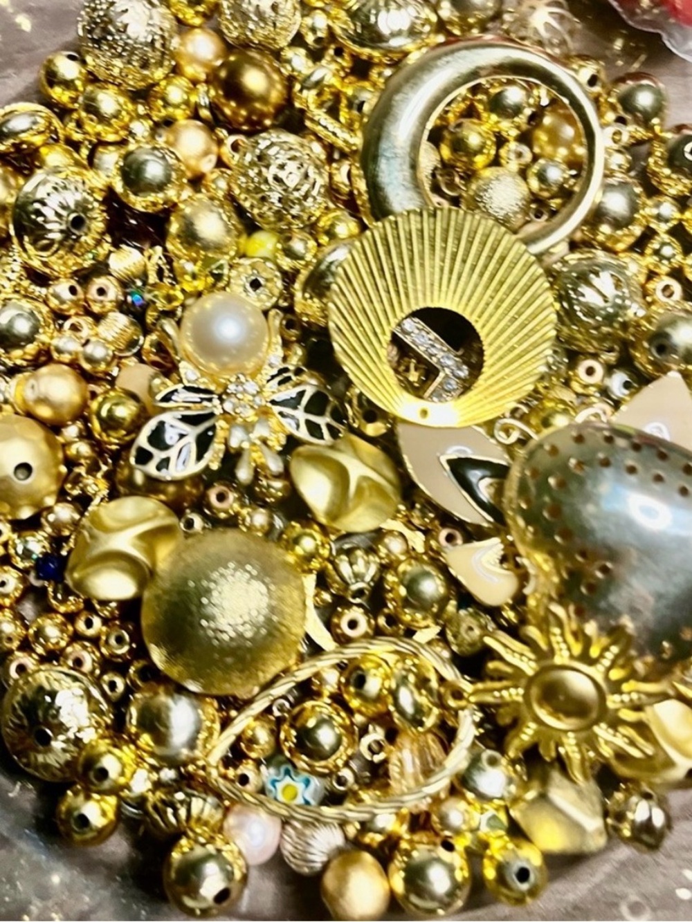 Vintage gold, beads, and trinkets.